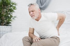 Ból kości ogonowej – przyczyny, objawy, formy leczenia