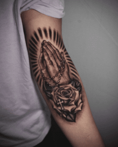 Tatuaż religijny na ręce