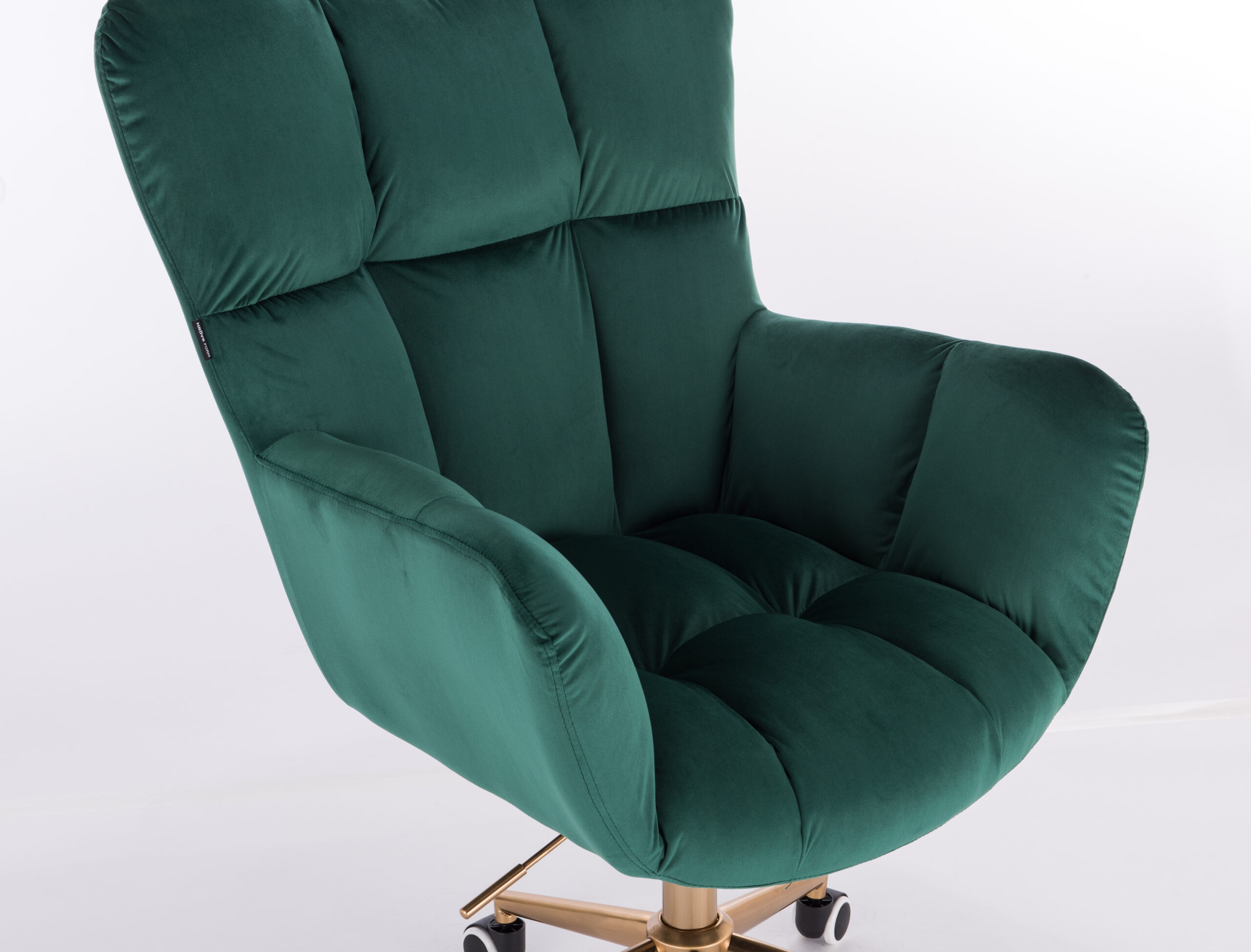Zielony welurowy fotel